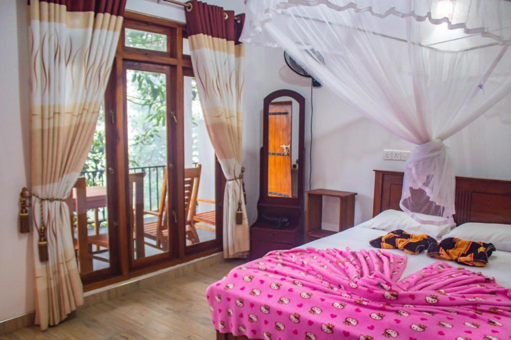 Amado Homestay Ella